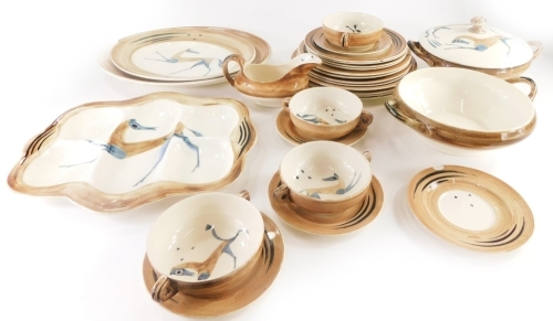 A Clarice Cliff Bizarre Chevaux pattern part dinner service, designed by John Armstrong, decorated with horses in blue and brown within a brown border, to include tureen and cover, hors d'oeuvres dish, two handled soup bowls, various plates, etc., some pi