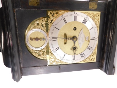 John Richardson, London. A George III ebonised bracket clock, the arched dial with silver chapter ring engraved with Roman numerals, gilt rococo scroll spandrels and strike silent subsidiary, the case with fret panels to the doors, canted corners on block - 2