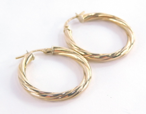 A pair of 9ct gold hoop earrings, each of twist design, 2.5cm high, 1.3g.