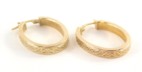 A pair of 9ct gold hoop earrings, each with woven decoration, 3cm drop, 1.8g.