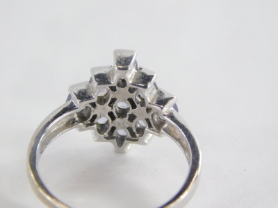 A dress ring, of layered design set with oval pale amethyst with three row central bar, and graduated outer layers, white metal, unmarked, ring size O, 3.6g all in. - 2