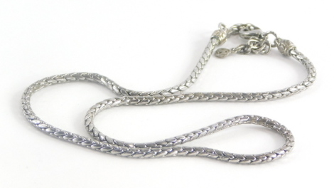 A costume jewellery necklace, in a silvered colour finish, makers stamp JM.