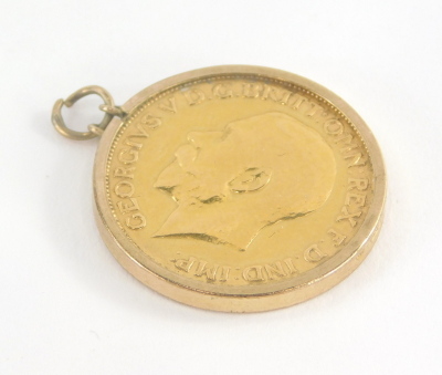 A George V full gold sovereign pendant, dated 1911, in a 9ct gold pendant mount, 8.8g all in.