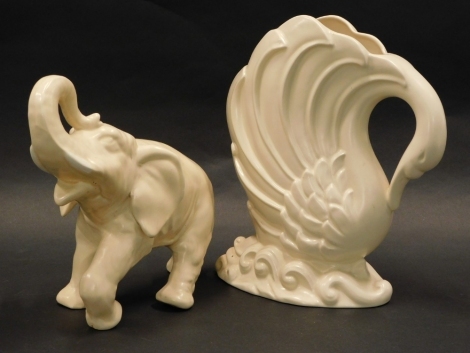 A Delcroft ware ceramic elephant, and a vase titled Leda. (2)