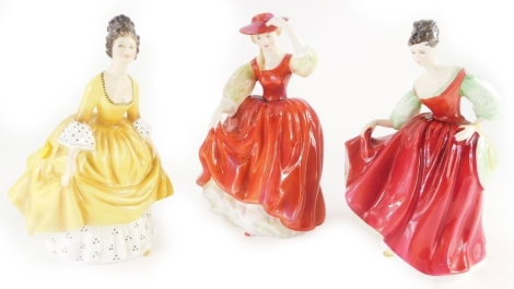 Three Royal Doulton figurines, Buttercup, Coralie, and Fair Lady, etc.