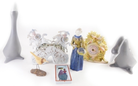 A collection of 20thC ceramics, to include two pottery geese, a figure of a lady with basket of flowers, a pottery clock decorated with flowers, signed Nancy Pliener, a Ben Holgate ceramic sculpture, and a Swedish dish. (some pieces AF)