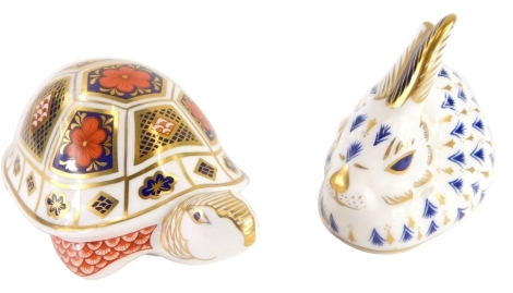 Two Royal Crown Derby porcelain paperweights, of a tortoise and baby rabbit, with silver stoppers. (2)