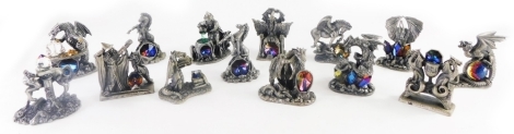 A collection of pewter Mythical Beast and Magician figurines, to include rearing horse, wizard on a dragon shaped throne, etc. (1 tray)