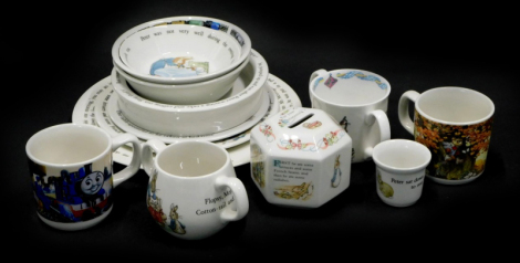 A collection of Wedgwood Peter Rabbit child's dinner wares, to include plate, bowl, loving cup, egg cup, a money bank, a Wedgwood Thomas the Tank Engine and Friends mug, etc. (1 tray)