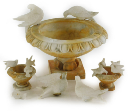 A 20thC marbled centrepiece, formed as an urn with floral outline, set with various doves, the smaller on square base, 12cm high, with smaller similar urns. (a quantity, AF)