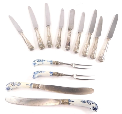 Four similar early 18thC pistol handled porcelain knives and forks, possibly Saint-Cloud and various other silver coloured metal knives.