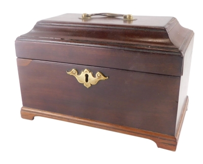 A mahogany tea caddy with brass mounts, the hinged lid enclosing a vacant interior, 33cm wide.