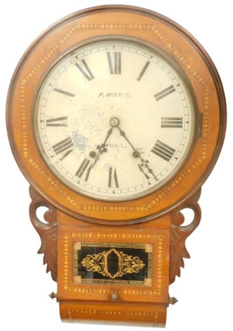 A late 19thC walnut and parquetry American drop dial wall clock, the painted dial stamped F Howe Hull above a glazed verre eglomise door, labelled interior for Anglo American Clocks trademark etc., New Haven USA, 70cm high.