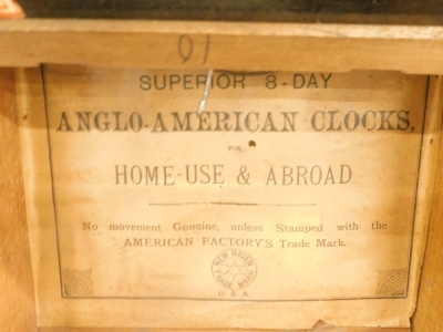 A late 19thC walnut and parquetry American drop dial wall clock, the painted dial stamped F Howe Hull above a glazed verre eglomise door, labelled interior for Anglo American Clocks trademark etc., New Haven USA, 70cm high. - 2