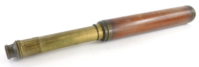 A brass and mahogany three draw telescope stamped Harris & Sons, Day or Night, 38cm long closed.