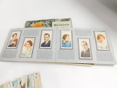 A collection of cigarette cards, some loose, to include Wills Cigarettes, Cavanders Ltd, W D & H O Wills, etc., some sets, and a quantity of mid 20thC carved hunting and horse figures with paper applied decoration. (1 tray) - 4