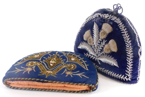 A Victorian beadwork tea cosy, backed on blue velvet decorated with thistles etc., and a further teapot cosy, on blue felt decorated with embroidery and with mother of pearl embellishments, etc. (2)