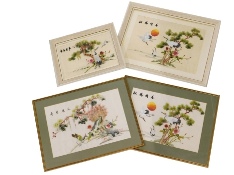 Four Chinese silk embroidered pictures, each depicting trees, flowering plants, birds in flight, etc., various sizes. (4)