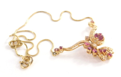 A garnet and cz set necklace, with floral design central section, unmarked, on a box link chain, unmarked, with a 9ct gold clasp.