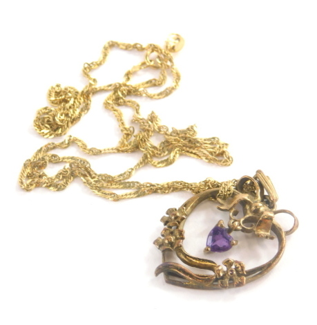 An Art Nouveau style pendant and chain, the gold plated Art Nouveau pendant set with purple paste stone, on a 9ct gold fancy link chain, 54cm long overall, 5.6g all in.