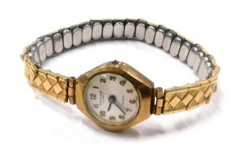 A 9ct gold Excaliber ladies cocktail watch head, with articulated strap.