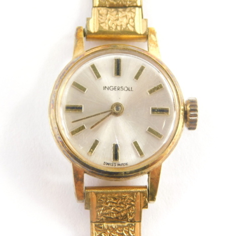 An Ingersol ladies wristwatch, with silvered coloured dial with stainless steel back, on a gold plated strap.
