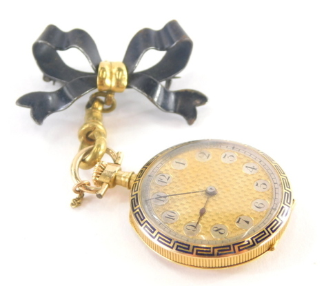 An Edwardian 14ct gold fob watch and chain, the fob watch with gold coloured dial and highlighted silvered numbers, with outer enamel and Greek key border, 2.5cm wide, bezel wind with a plain design back with similar border and tiny diamond set centre old