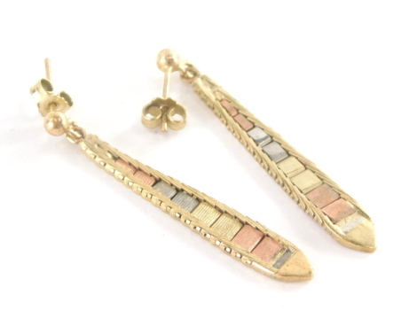 A pair of 9ct gold tri-colour drop earrings, each of articulated form, with single ball stud, 3.5cm high, on pin backs with butterfly backs, 3.2g.