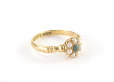 A Victorian dress ring, with central floral design, with a turquoise agate, surrounded by seven seed pearls on pierced and flanked shoulders, yellow metal marked 18c, Birmingham 1898, ring size N½, 2.9g all in.