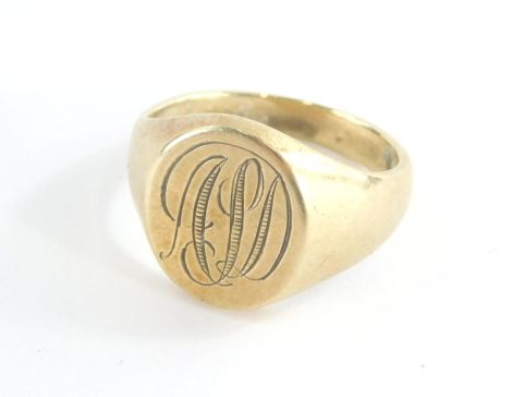 A 9ct gold gentleman's signet ring, with oval shield bearing the initials APD, hallmarks rubbed ring size M½, 8.7g.