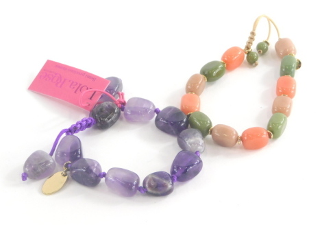 Two items of Lola Rose jewellery, to include an amethyst coloured bracelet and a green and pink stoned bracelet, in presentation sleeves. (2)