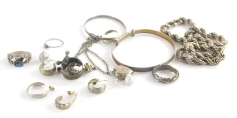 A group of silver and other jewellery, to include silver bangles, hoop earrings, rope twist necklaces etc. (quantity)