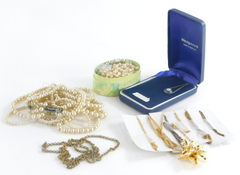 A group of various costume jewellery, faux pearl necklaces, gold plated bracelets, a Wedgwood pendant, etc. (1 box)