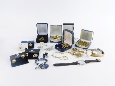 A group of modern costume jewellery and effects, wristwatches empty boxes, gold plated necklaces, cuff links, dress rings etc. (1 tray)