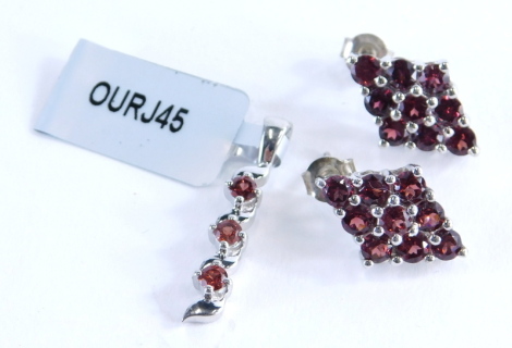 A Gemporia garnet jewellery set, comprising a Nampula garnet and silver pendant, and a set of Rajasthan garnet earrings, each with certificate, 6.5g all in.