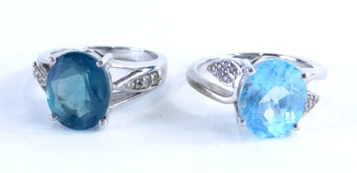 Two Gemporia silver dress rings, to include a Tuscan green fluorite and white topaz stone silver ring, and a sky blue topaz and white zircon sterling silver ring, each with certificate, 8.2g all in.