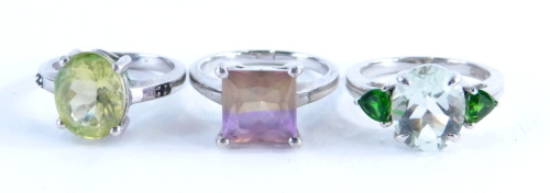 Three Gemporia silver dress rings, to include citron feldspar and champagne diamond dress ring, a Prasiolite and Chrome Diopside ring, together with a Anahi Ametrine sterling silver ring, 10.8g all in. (3)