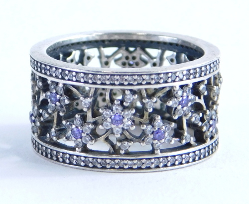 A silver amethyst and cz set Pandora dress ring, of Forget Me Not design set with amethyst and cz stones, in pierced detailing, ring size P, boxed, 7.1g all in.