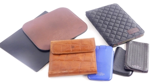 A collection of small leather and associated goods, to include a Coach brown leather mouse pad, a Mulberry mock crock CD case, with tartan lining, a Mulberry black pebbled leather phone case, two Smythson phone cases, etc. (a quantity)