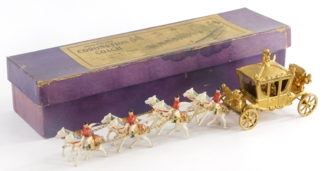 A mid 20thC Johillco series miniature lead coronation coach, pulled by an arrangement of horses, 30cm long, boxed.