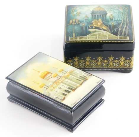 Two 20thC Russian lacquered boxes, each decorated with depictions of Russian Orthodox churches, signed. (1 box)