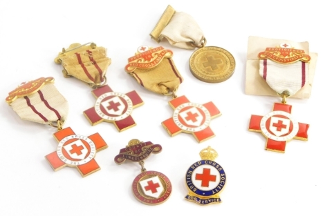 A quantity of enamel Red Cross Society badges for proficiency in nursing, awarded to a 07426S Richardson and an Isabel Richardson, one dated 1917, etc.