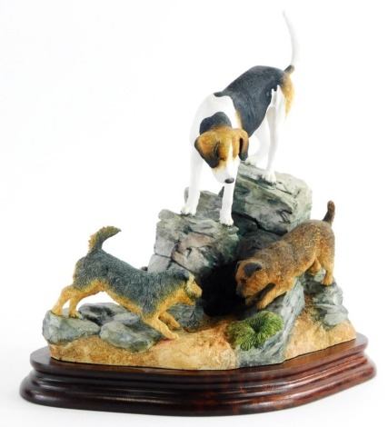 A Border Fine Arts figure group of fell hound and terriers, BO885, signed Ann Wall, number 672/950, on hardwood base, 24cm high, boxed.