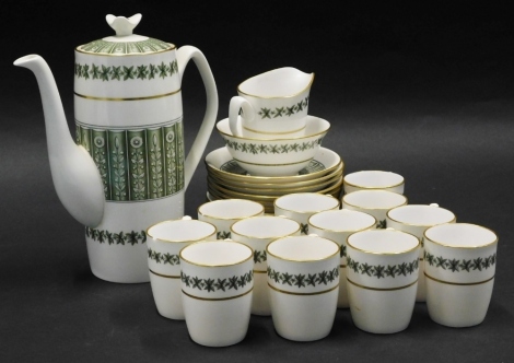 A Spode Provence pattern part coffee service, pattern number Y7843, on a white ground decorated with green flowers, leaves, etc., with gilt highlights.