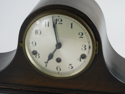 A 20thC oak cased Napoleon hat mantel clock, with Arabic numeral dial, chiming eight day movement. - 2