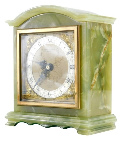 An onyx Elliott clock retailed by Bracher and Sydenham, Reading, with a brass Roman numeric dial, 15cm high.