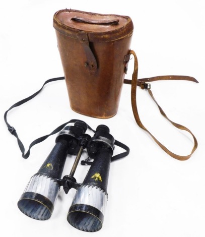 A pair of Barr and Stroud military issue binoculars, in leather case.