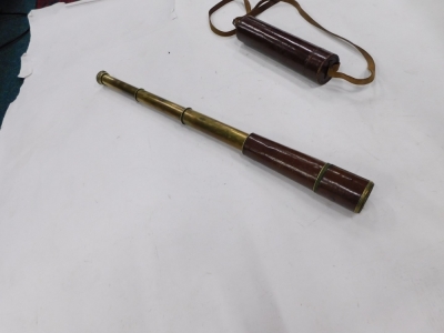 A Broadhurst Clarkson and Co Limited four drawer brass and leather telescope, stamped Tel. Scc. Rgts. Mk. 2s, dated 1940, numbered 1584, and a carrying case. - 2