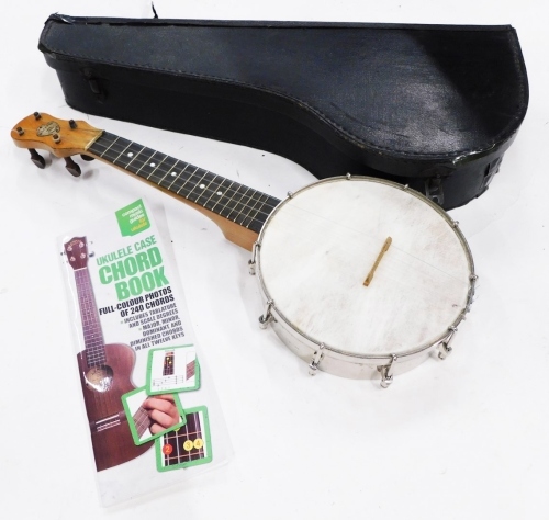 A Dulcetta ukelele banjo, 56cm long, in fitted case.