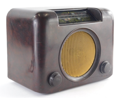 A Bush Bakelite radio, model 73/89780, (AF), 29cm wide.